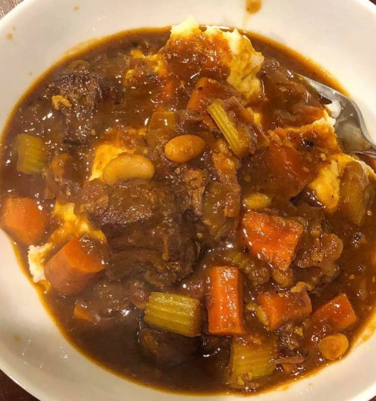 Beef Stew served over Mashed Potatoes